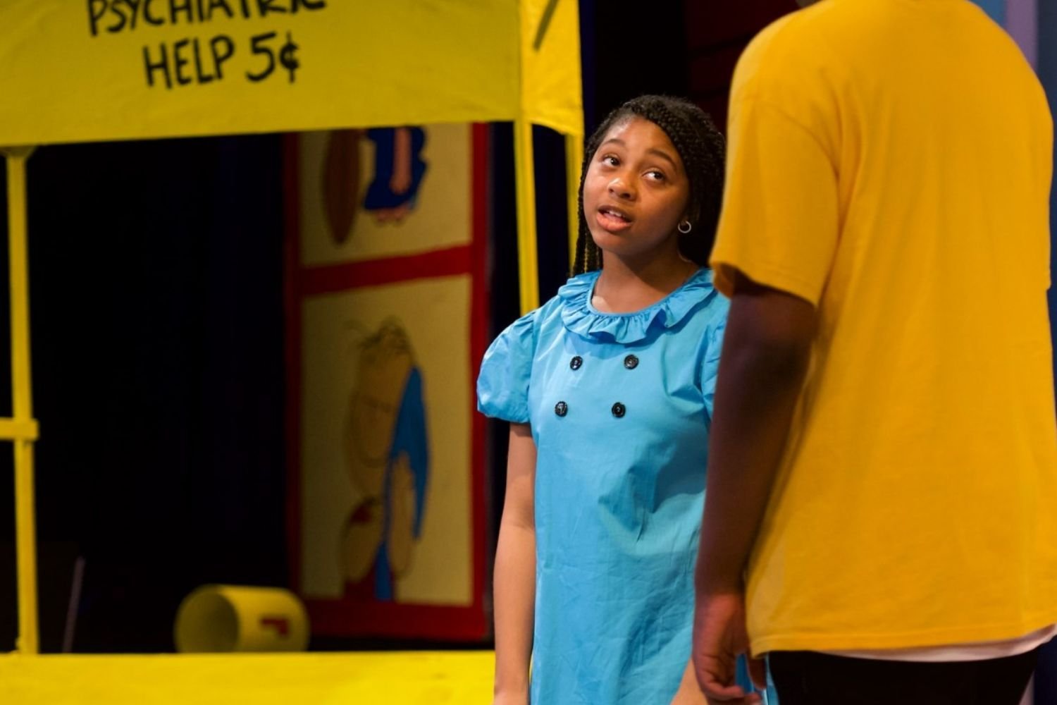 student play Charlie Brown